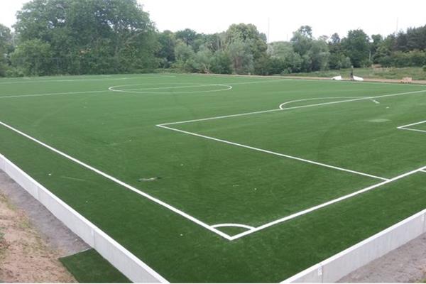 Aanleg kunstgras voetbalveld - Sportinfrabouw NV